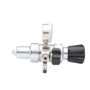 The Harris HP702-050-320-BE Carbon Dioxide Regulator features a top pressure gauge, right black control knob, and bottom threaded connector, shown isolated on a white background.