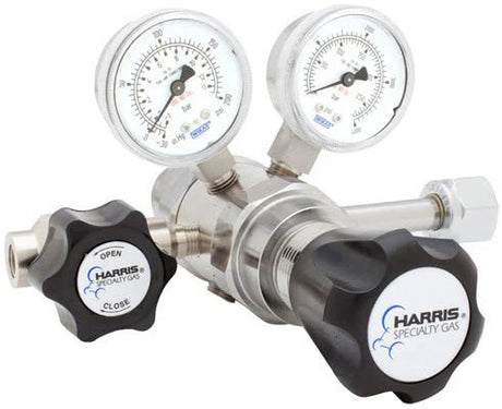 The Harris 742-015-240-A Ammonia Regulator features high purity, two pressure gauges, a large adjustment knob, and directional Open/Close labels.
