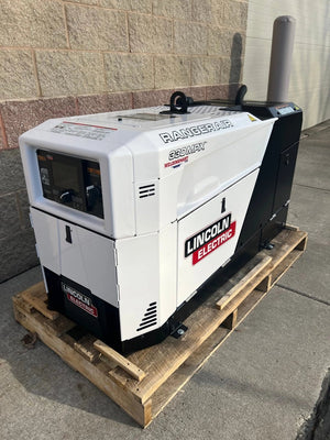 Lincoln Ranger Air 330MPX Multi-Function Engine Drive Demo welding machine on pallet, outdoors by stone wall—WeldingMart equipment.