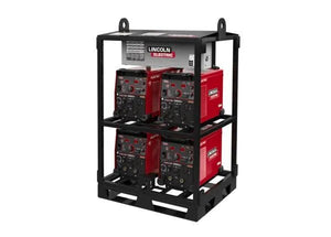 A black modular rack holds four red Lincoln K4726-2 Flextec 350X PowerConnect 4-Pack power sources, stacked two per shelf. Each unit features knobs, switches, and digital displays. The frame includes lifting hooks and forklift slots.