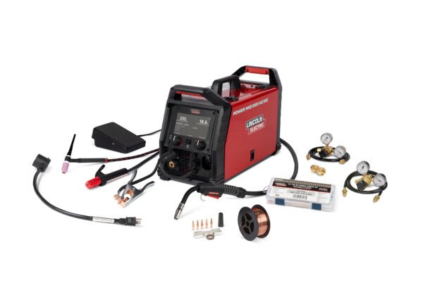 Lincoln POWER MIG 220 AC/DC Multi-Process Welder K5379-1 with cables, wire spool, gas regulators, and toolkit on white background.