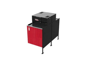 The Lincoln Prism Exhaust Booth Back-to-Back Add-On (K5664-8) is a rectangular unit with a black body, red front panel, ventilation grilles reminiscent of the Prism design, control panels on top, and four legs—all shown on a white background.