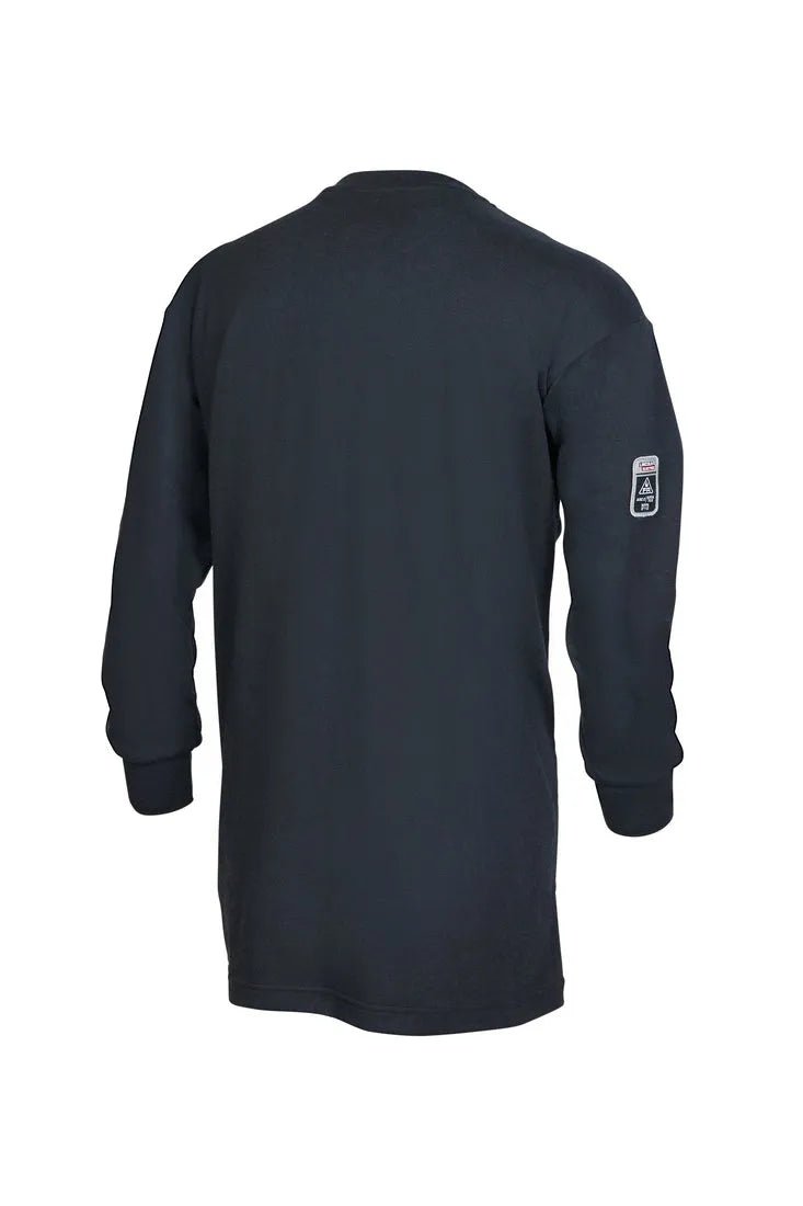 The Lincoln K5267-3XL Arc Rated FR Welding T-Shirt 3XLarge is shown from the back, featuring cuffed long sleeves and a small rectangular patch with text and graphics on the upper left sleeve. The overall black FR design is simple and unadorned.