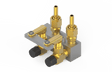 Bug-O 2 Hose QA Manifold MDS-3025 welding accessory with dual brass valves, black knobs, and hose connectors on gray base.