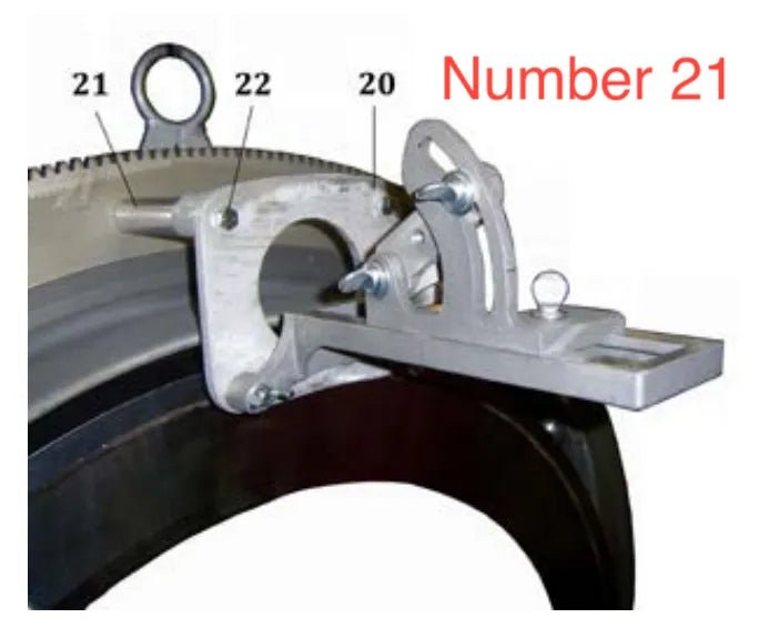 A metal mechanical component, such as a Mathey Dearman Extension Plate Spacer, with labeled parts 20, 21, and 22 is attached to a large circular structure—ideal for pipe handling. Number 21 appears in red in the upper right corner.