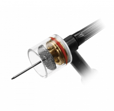 A close-up view of a modern tattoo machine featuring a transparent casing, visible internal components, and a black ergonomic handle—reminiscent of the precision engineering found in TIG torch or titanium welding tools.