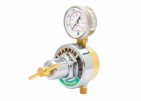Harris 247-125 1/4 in. RH Single Stage Oxygen Regulator for welding, brass/chrome, pressure gauge, green tag, on white.