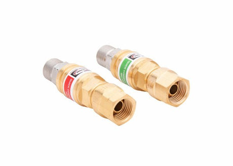 Harris 26-QCR regulator quick connectors, brass oxy-fuel welding accessories, red/green tags, threaded ends, on white background.