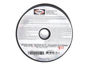 A 2 lb (0.9kg) spool of Harris 308 Stainless Steel MIG GMAW Welding Wire - 0030812, Alloy ER308, AWS A5.9, 0.023 in (0.6mm), English/French label with red and black print on white for welding applications.