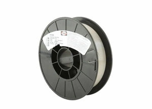 A black plastic spool holds Harris 308 Stainless Steel MIG Welding Wire, 0.025 in (0.64 mm), 10 lb spool (0030815). A white label with text and barcode is attached, and the spool is angled against a white background.