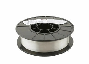 A spool of Harris 308 Stainless Steel MIG Welding Wire (0.025 in/0.64 mm, 10 lb, 0030815) is wound around a black reel with a white label and photographed on a plain white background.