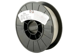 A black plastic spool holds Harris 308L Stainless Steel MIG GMAW Welding Wire - 0308L15, with a white label showing details. The spool features a central mounting hole, and the wire is neatly wound. The background is plain white.