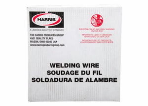 A white box displays the Harris logo at the top left, company contact info, and a red warning symbol with safety text in English, French, and Spanish. Bold black text reads “WELDING WIRE,” highlighting Harris 308L Stainless Steel MIG Welding Alloy - 0308L18.