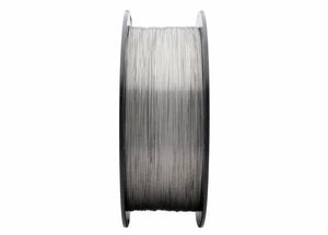 A close-up of a Harris 308LT1-1 Dynacore Stainless Flux-Cored FCAW Welding Wire (.035 x 25# Spool, 308LFCF8) shows shiny wire wound evenly around a black plastic reel, standing out against a white background with both reel sides visible.