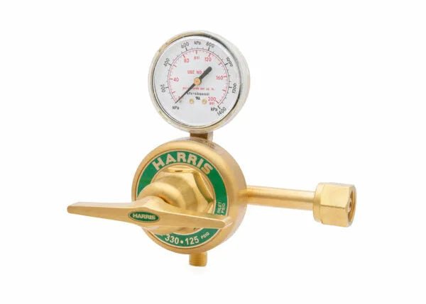 A brass oxygen regulator with a pressure gauge on top, labeled Harris. Designed for high pressure cylinders, the single stage oxygen regulator features a green circular label and displays precise pressure readings.