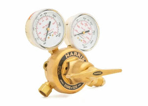 A Harris 3500 regulator with two pressure gauges and a large horizontal adjustment handle, this high-flow cylinder regulator is ideal for controlling argon, helium, or nitrogen gas flow in welding or industrial applications, with dials displaying psi and kPa.