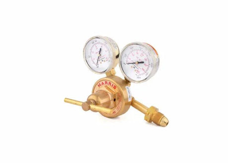 A Harris single stage industrial regulator for acetylene, featuring a brass body, dual pressure gauges in psi and kPa, a control knob, and an outlet fitting. The acetylene regulator is set against a plain white background.