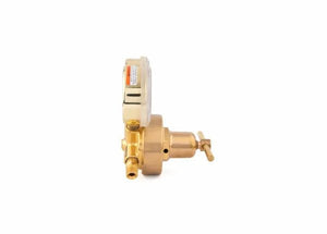 Side view of a brass water meter with a white plastic top and a dial, resembling an industrial regulator, isolated on a white background.