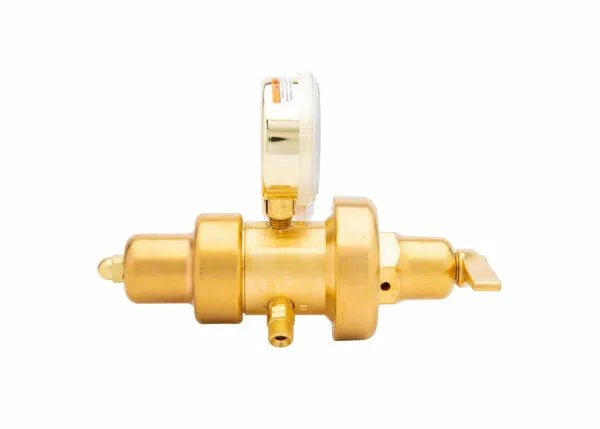 A gold-colored LPG regulator with a gauge attached on top, showing its dial. The device, often used in welding applications, has several cylindrical sections and connector points for precise control of gas or liquid flow.