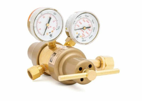 A brass two stage regulator with two pressure gauges and adjustment knobs, designed for precise control and measurement of gas flow in industrial or laboratory applications.