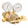 A brass two stage regulator with dual pressure gauges and a T-shaped adjustment handle, designed for controlling and monitoring gas flow in industrial applications.