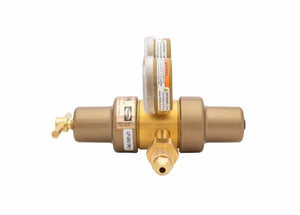 A brass industrial pressure regulator, the Harris Model 9296, with two pressure gauges and a control valve, designed for connecting to a gas cylinder or tank. The LPGas-labeled two stage pressure regulator is shown against a white background.