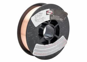 A spool of Harris ER70S-6 Mild Steel MIG Welding Wire (.030, 11LB, E70S6E5) features copper-hued wire on a black reel. The white/gray label shows “70S-6” and the Harris logo, partially covered by clear plastic wrapping.