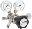 The Harris Two Stage Ultra High Purity Brass Barstock Regulator Model 721C-500-350-F features dual dial gauges, a large HARRIS SPECIALTY GAS adjustment knob, and multiple gas line fittings—ideal for ultra high purity applications.
