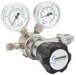The Harris Regulator 741-500-580-D features stainless steel construction, dual pressure gauges for cylinder and outlet, a large black HARRIS SPECIALTY GAS adjustment knob, and threaded connectors for secure gas line attachment.