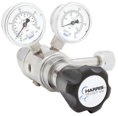 The Harris 742-125-326-C Nitrous Oxide Regulator features a silver 316L stainless steel two-stage design, dual pressure gauges, a black “HARRIS SPECIALTY GAS” knob, and robust metal fittings for precise high-purity gas control.