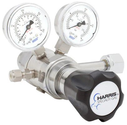 The Harris 742-015-326-D Nitrous Oxide Regulator is a stainless steel unit with two round pressure gauges, a large black "HARRIS SPECIALTY GAS" adjustment knob, and multiple metal gas fittings for high purity applications.