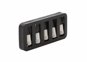 A black rectangular plastic holder displays four metallic Harris Model 26-L Ignitor Renewal Flints (9004484) with silver ends, arranged in a row and angled to show the top and one side against a plain white background.