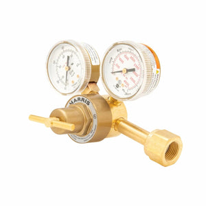 Harris 3000164 brass single-stage welding gas regulator with dual gauges, T-handle, and threaded connector for cylinders.