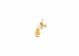 A brass plumbing valve with a white handle, featuring a low pressure injector mixing system, is centered on a plain white background.