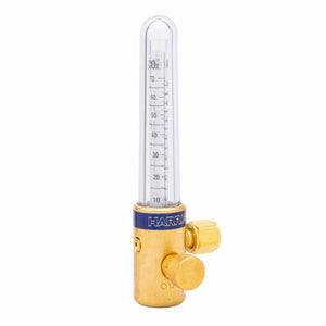 A brass flowmeter with a clear vertical tube marked with measurements, a flow adjustment knob, and a side fitting for gas input/output—ideal for gas-shielded welding. The brand name “HARRIS” appears on a blue band near the top.