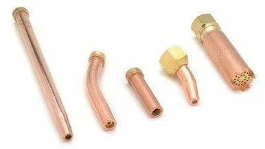 Five different copper and brass torch tips, including a gouging tip and a propane cutting tip, are lined up horizontally on a white background, showcasing a variety of shapes and sizes.
