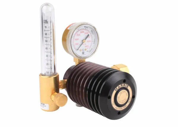 The Harris 3100096 - 6S-CD-80F-320 Single Stage Flowmeter Regulator features brass and black construction, a round dual-scale gauge (psi/kg/cm²), transparent vertical flow meter up to 10, valves, connectors, and a “Harris” label.