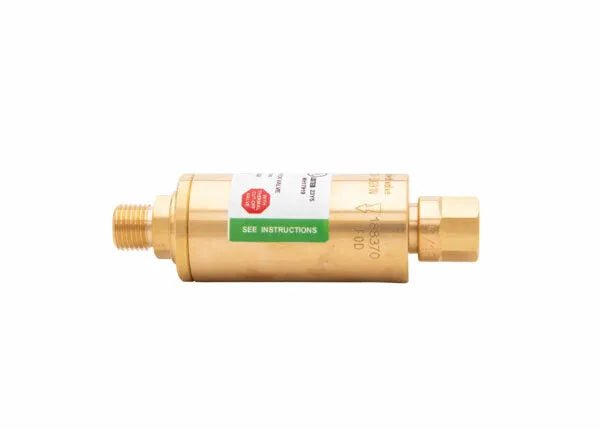 A brass water heater vacuum relief valve with threaded fittings on both ends and a white sticker label, similar in design to a regulator-type flashback arrestor, shown against a plain white background.