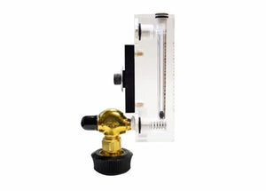 A side view of the Harris 5401201 - FM520 HVAC Flowmeter shows a clear acrylic vertical tube, brass valve with black plastic knob at the base, plus visible screws and fittings against a plain white background.