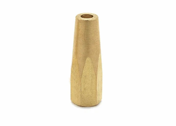 A small, cylindrical brass object with a tapered shape and a hole through the top, this Oxy-acetylene welding tip stands upright on a white background.