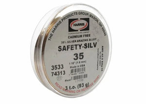 A round metal tin of Harris 3533 - Safety-Silv® 35 high silver brazing alloy, cadmium-free with 35% silver, size 1/16, net weight 3 oz. Label warns: READ WARNING ON REVERSE SIDE.