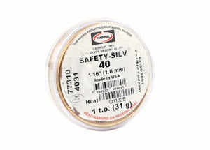 A circular spool labeled Harris 4031 - Safety-Silv® 40 high silver brazing alloy, cadmium-free and corrosion-resistant, 1/16 in., 1 t.o. (31 g), Made in USA. Red text: READ WARNING ON REVERSE SIDE.