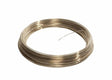A coiled bundle of Harris 40350H Safety-Silv 40 Silver Brazing Alloy, 1/16 in (1.6 mm), cadmium-free, shines on a white background with one loose end extending from the neat metallic loop. Packaged as a 50 troy ounce coil per box.