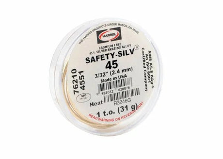 A round plastic container holds Harris 4551 Safety-Silv 45 high silver brazing alloy, 3/32 in., 1 troy ounce, cadmium-free, made in USA. Product codes and a red warning to read the reverse label are present.