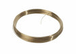 A neatly coiled loop of Harris 50N325 Safety-Silv 50N Silver Brazing Alloy, 1/16 in (1.6 mm), sits on a plain white background with one loose end protruding, showing the shiny silver wire remains unused.