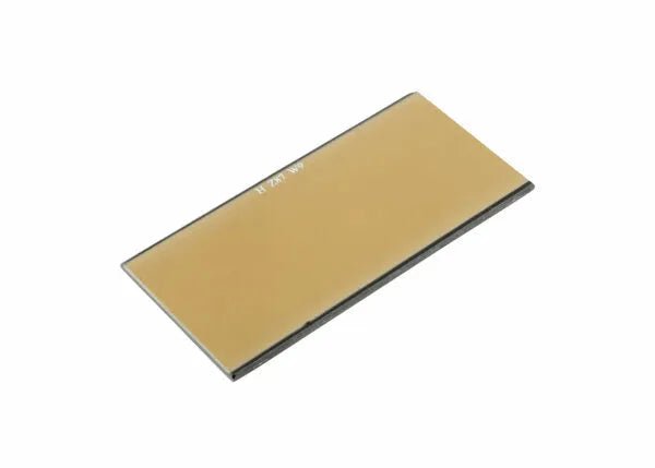 Harris Shade 10 Glass Gold Mirror Welding Filter Lens 2"x4-1/4" 1093100, smooth surface, shown angled on white background.