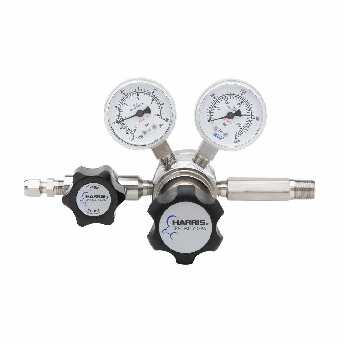 The Harris 742-050-240-AD Ammonia Regulator is a two-stage, dual gauge high purity regulator with black adjustment knobs, metal cylinder fittings, and two pressure dials—engineered for precise ammonia control.