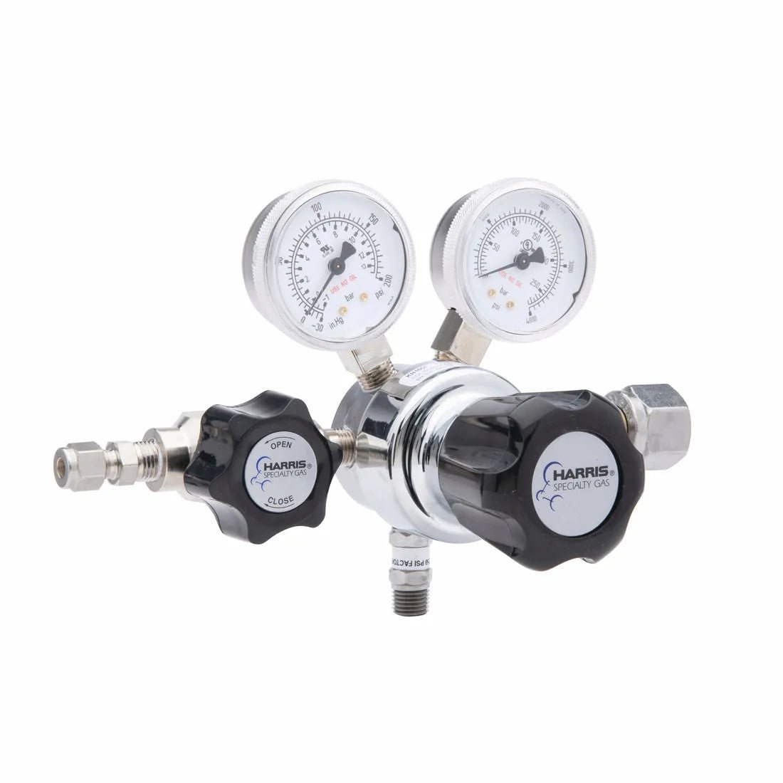 The Harris 742-125-660-AD regulator features dual gauges, two black adjustment knobs, and dual pressure dials for precise ammonia or nitrogen dioxide gas control—ideal as a stainless steel cylinder regulator.