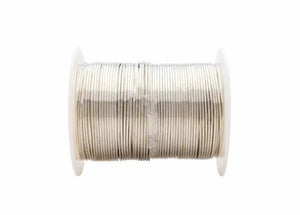 A 25 lb spool of Harris Stay Brite Lead-Free Solid Wire Solder (0.118 in/3.0 mm, SB625) is tightly wound around a white plastic reel, showcasing its smooth, shiny metallic finish against a clean white background.