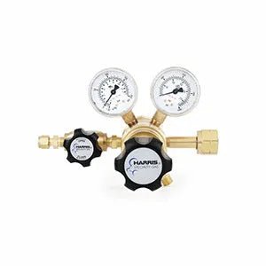 The Harris Two Stage Ultra High Purity Brass Barstock Regulator Model 722-125-350-BE features dual pressure gauges, black adjustment knobs, a labeled Harris logo, and is ideal for precise gas control in gas chromatography applications.